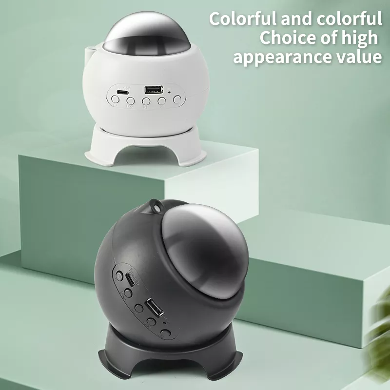 Black and white color options for MODI Northern Lights star projector on display blocks.