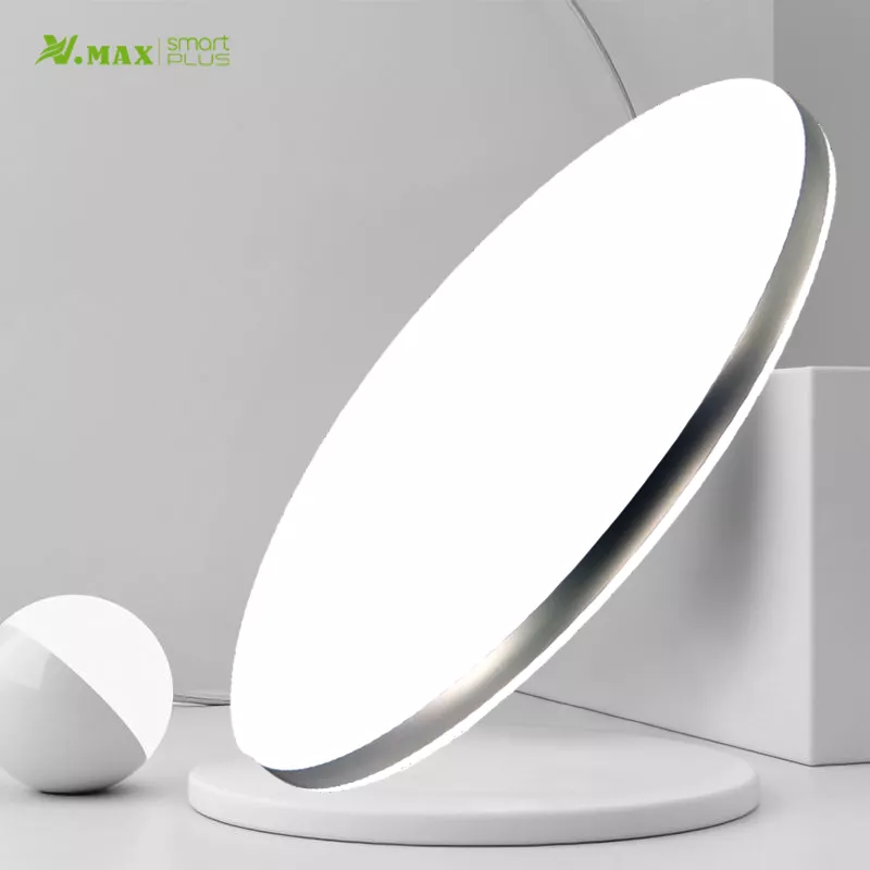 Minimalist round LED light displayed on white stand for product showcase