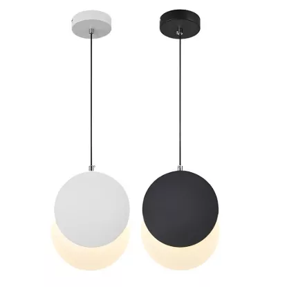 Modern black and white globe pendant lights with acrylic diffuser hanging from ceiling