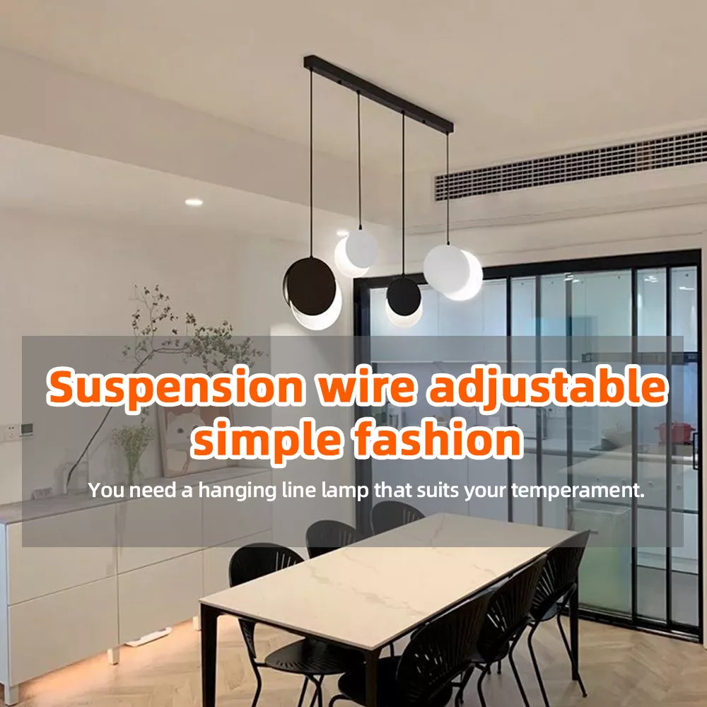 Modern dining room with five suspended globe pendant lamps in black and white finish
