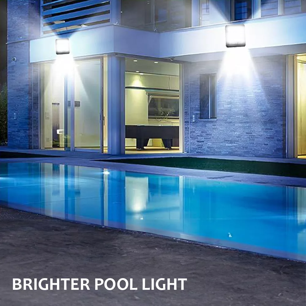 Bright LED solar floodlights installed around pool area for evening lighting