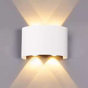 Modern LED up and down wall light showing dimensions 12cm width and 9.5cm height with warm lighting effect