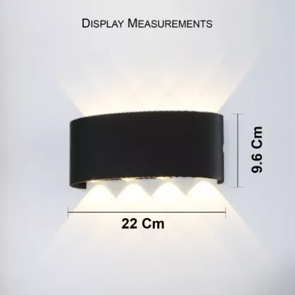 Modern LED wall light with 22 cm width and 9.6 cm height showing compact size and up down lighting beam pattern