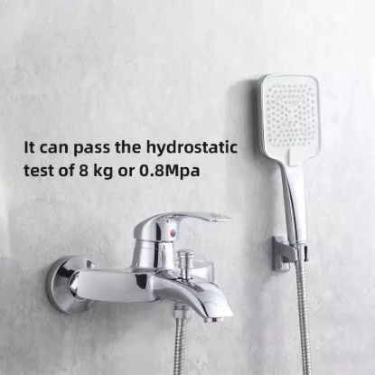 Chrome wall-mounted bathtub faucet connected to a 1.5-meter stainless steel flexible shower hose in a modern white bathroom.