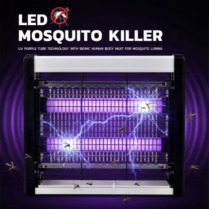 LED mosquito killer lamp with UV purple light and electric shock grid in action zapping mosquitoes