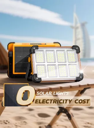 Solar LED floodlight with no electricity cost placed on beach table