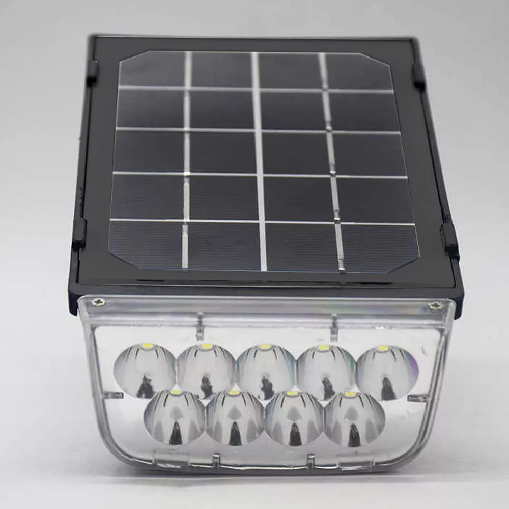 Top view of solar spotlight showing solar panel and LED reflectors