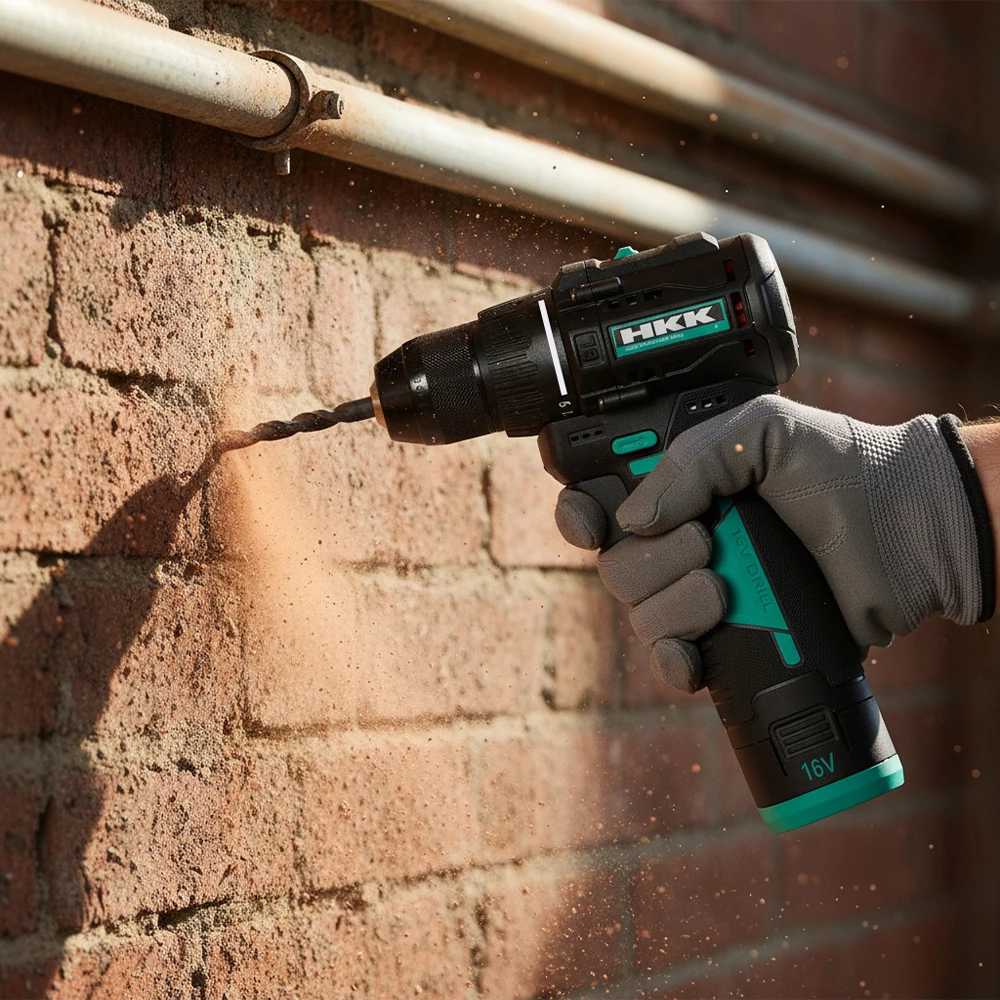 cordless brushless drill drilling into brick wall construction site use