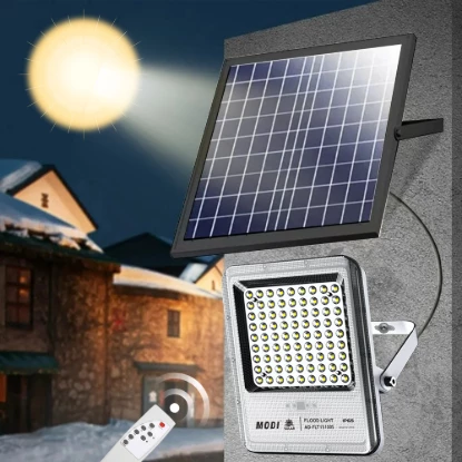 MODI solar flood light with solar panel and remote control mounted outdoors